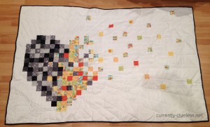 The quilt front - sadness overtaking the happiness and pushing it out of my heart.